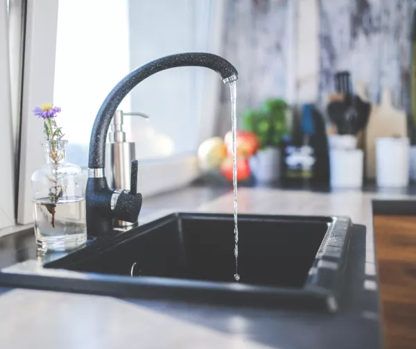 kitchen faucet with water running