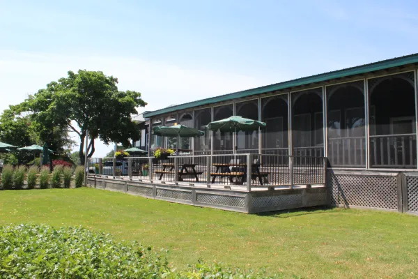 Exterior of the Spruce & Iron restaurant with patio.