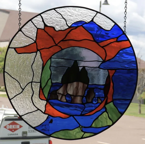 Stained glass art piece representing hopewell rocks 