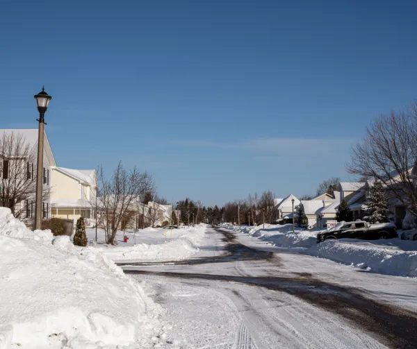 A snowy neighbourhood street