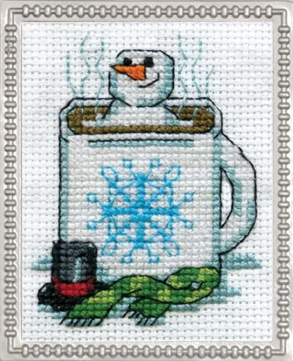 Cross stitch pattern of a snowman melting in a mug of hot chocolate.