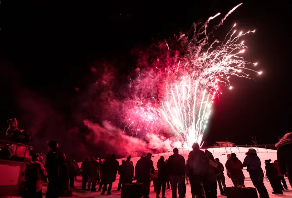 People watching fireworks at Winter Wonderland Park