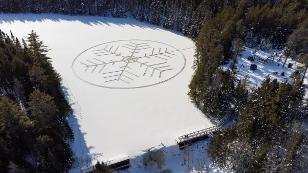 Giant snowflake design imprinted on the Mill Creek Nature Park reservoir.